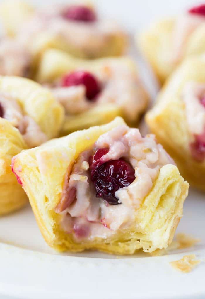 These sweet cranberry tartlets are a perfect holiday snack idea that family and friends will love. The perfect finger food for a crowd! #appetizerideas #easyrecipes #dessert #holidaydessertideas #thanksgivingdessert #christmasdessert Sweet Cream Cheese Cranberry Tartlets