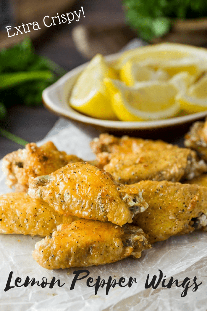 These lemon pepper wings are extra crispy and brushed with a simple combination of lemon and butter, then topped with freshly ground pepper. This post also includes tips on how to perfectly grill, bake, and fry the perfect crispy chicken wing. #chickenwings #wings #chicken #lemonpepper #lemon #appetizers #friedchicken #bakedchicken #grilledchicken #grilling #meat #partysnacks