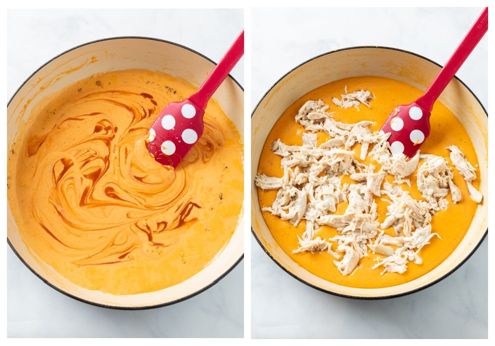 Mixing hot sauce and shredded chicken into cheese sauce for buffalo chicken mac and cheese.