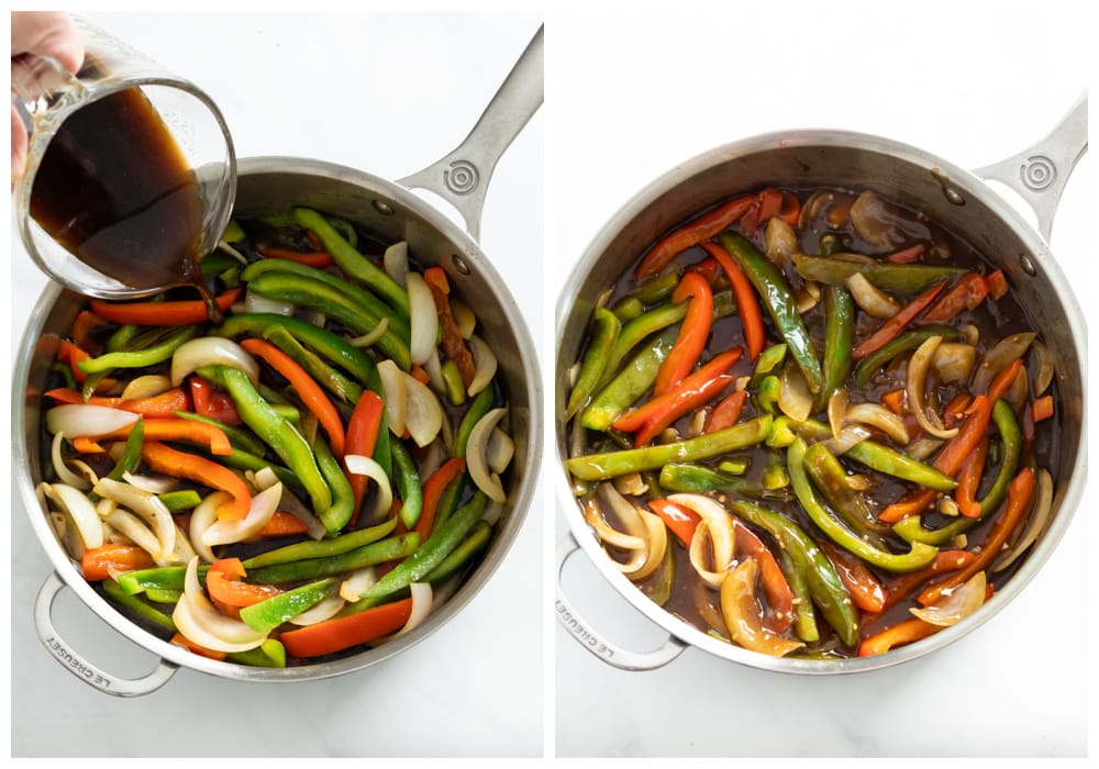 A skillet with cooked onions and peppers with pepper steak sauce being added.